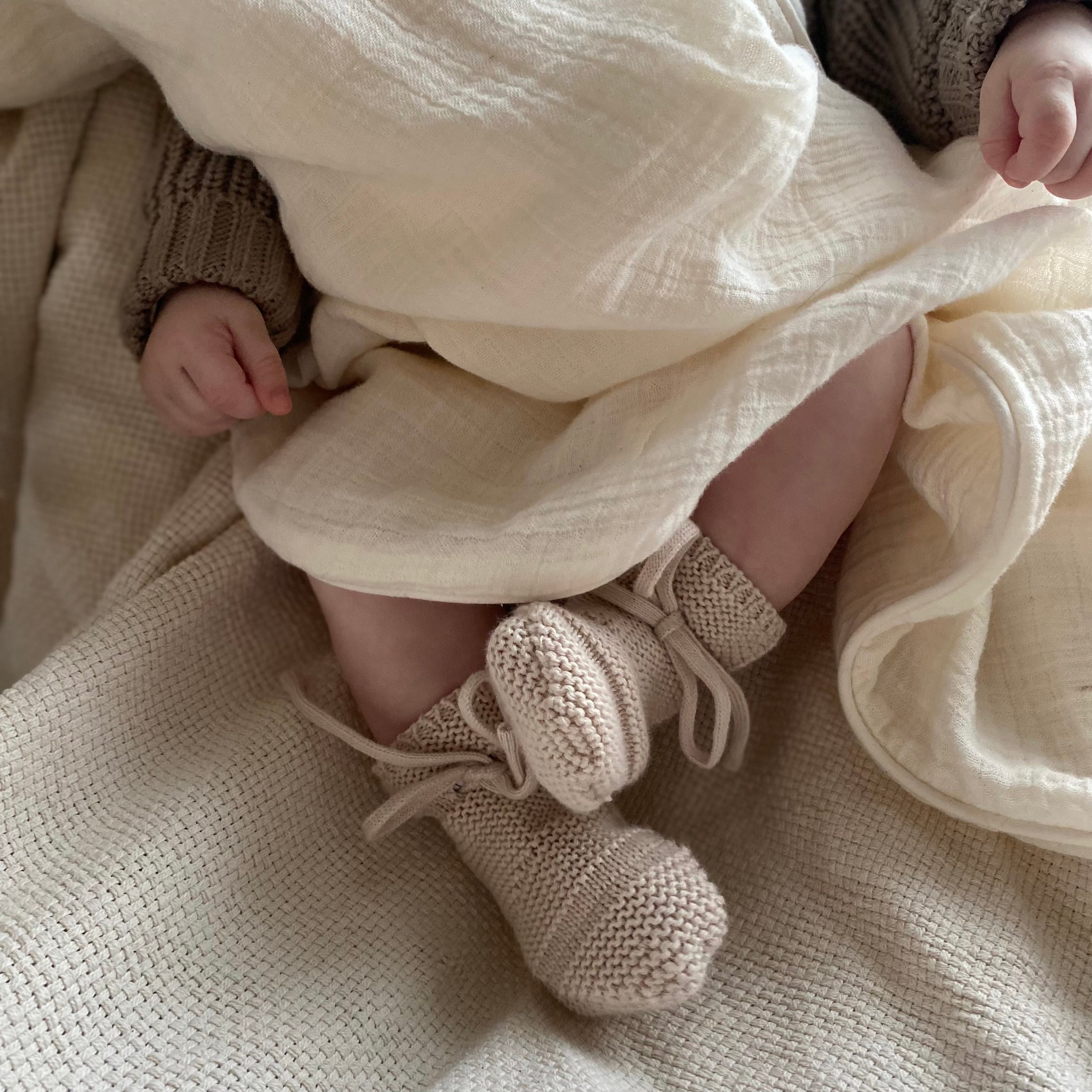 Knitted baby shoes made from organic cotton